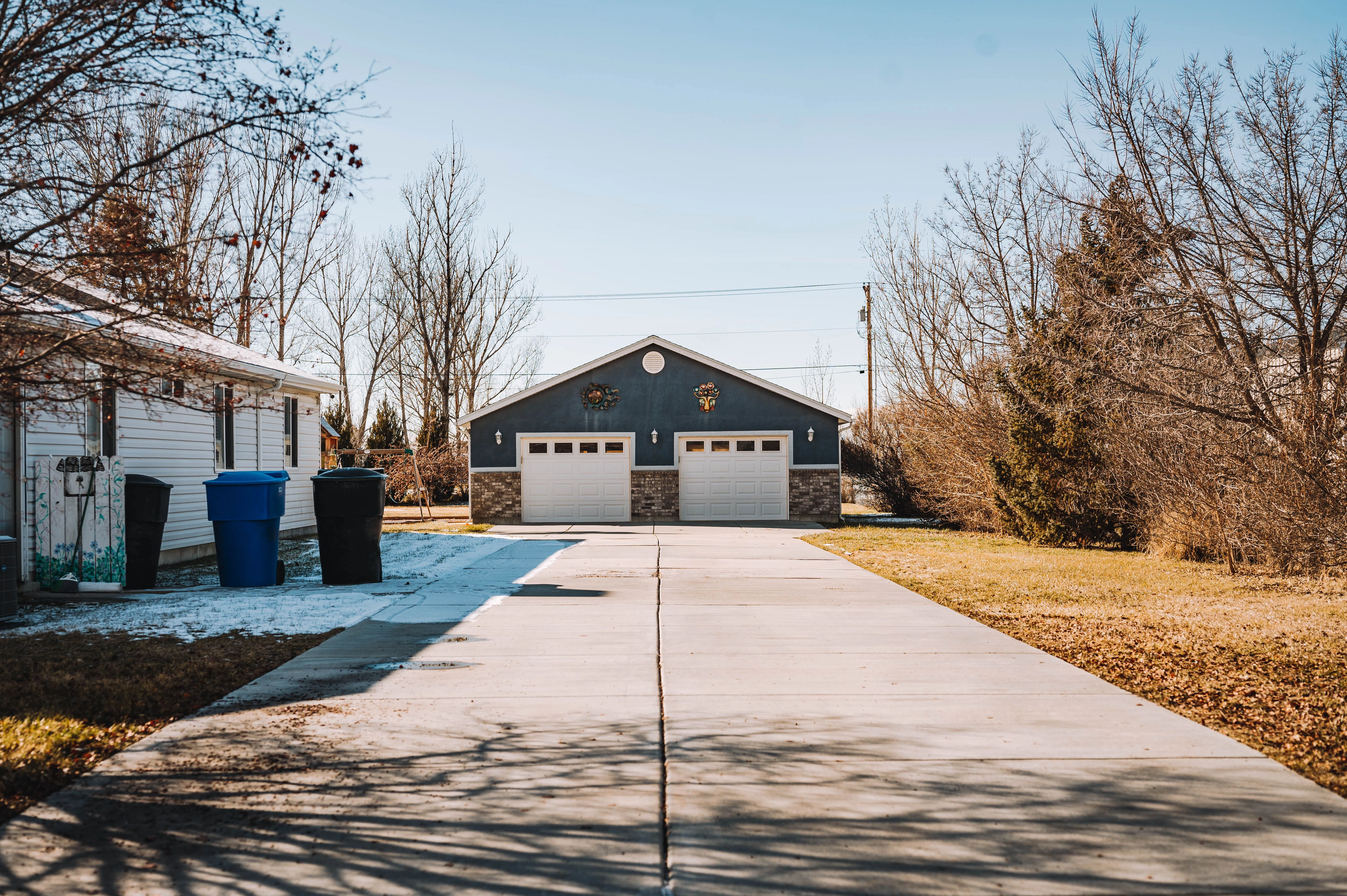 2000s-era Plano Texas suburban home with attached garage